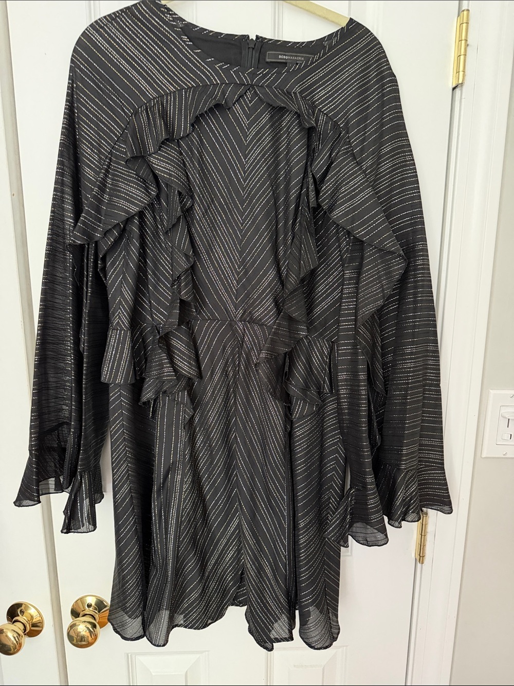 BCBGMaxAzria Black dress with Silver and gold metallic thread.